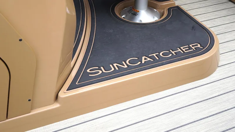 Slide: The Image of SunCatcher Fusion 324SS 2025 boat deck with logo detail. - 15