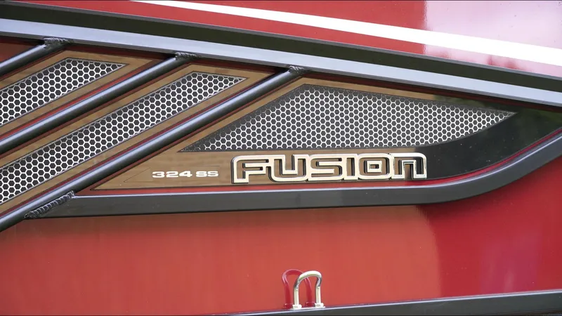 Slide: The Image of 2025 SunCatcher Fusion 324SS logo on a sleek red surface. - 24