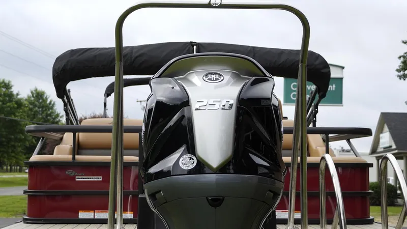 Slide: The Image of 2025 SunCatcher Fusion 324SS boat with powerful 250 horsepower engine, rear view. - 7