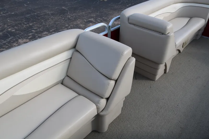 Slide: The Image of 2013 Bennington 22 SLX boat interior with beige cushioned seating. - 17