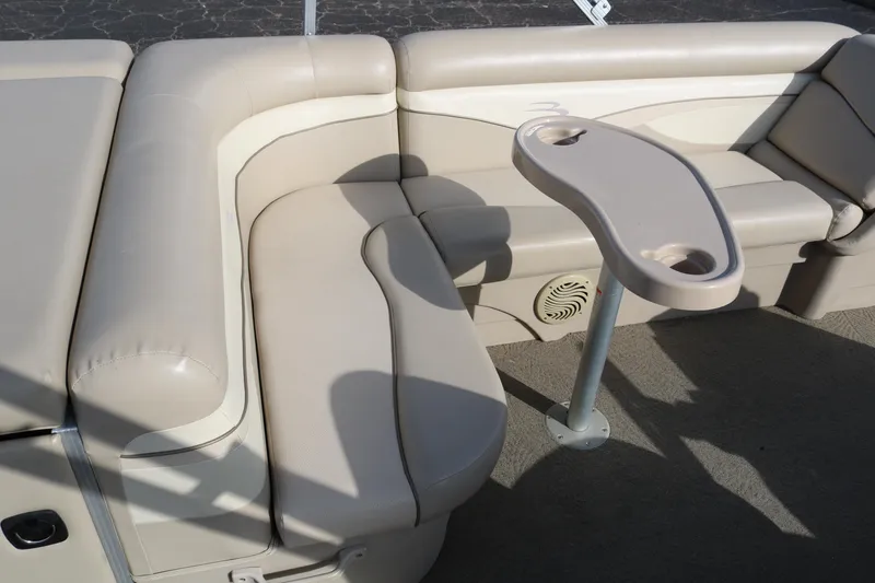 Slide: The Image of Beige seating area with table on 2013 Bennington 22 SLX boat. - 19