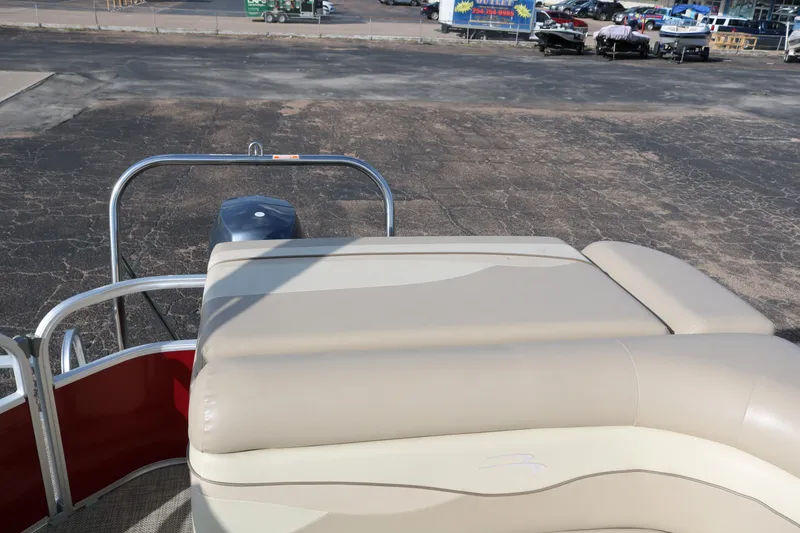 Slide: The Image of 2013 Bennington 22 SLX pontoon boat with beige seating and metal railing. - 21