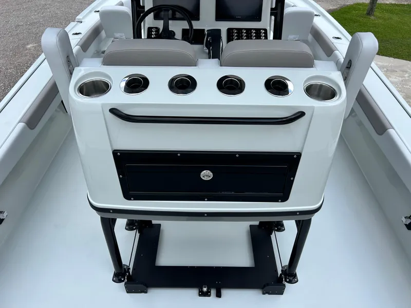 Slide: The Image of 2026 Caymas 28 HB boat interior with dual seats and cup holders. - 20