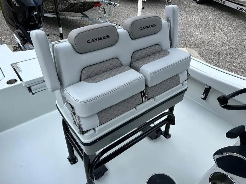 Slide: The Image of 2026 Caymas 28 HB boat seating with cushioned backrests and sleek design. - 24
