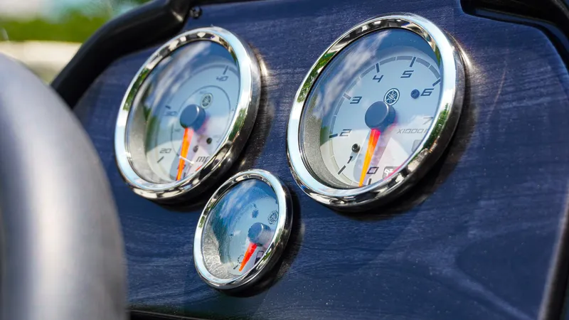 Slide: The Image of Close-up of 2025 G3 Angler V164 C boat dashboard gauges. - 14
