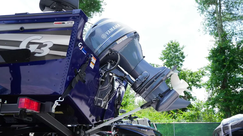 Slide: The Image of 2025 G3 Angler V164 C boat with Yamaha outboard motor, rear view. - 15