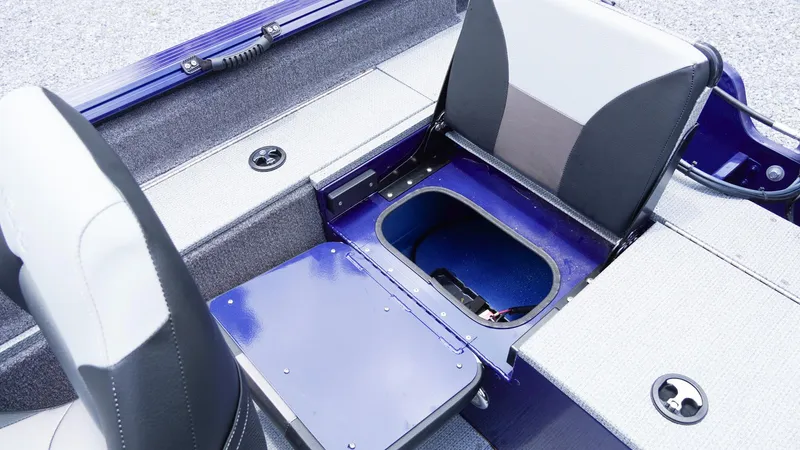 Slide: The Image of 2025 G3 Angler V164 C boat interior with storage compartment and seating. - 24