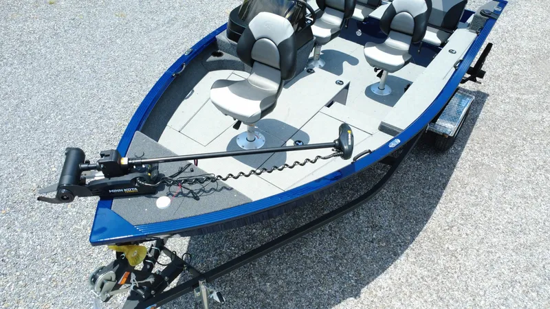 Slide: The Image of 2025 G3 Angler V164 C fishing boat with seating and trolling motor on trailer. - 7