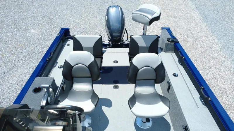 Slide: The Image of 2025 G3 Angler V164 C boat interior with four seats and motor, top view. - 8