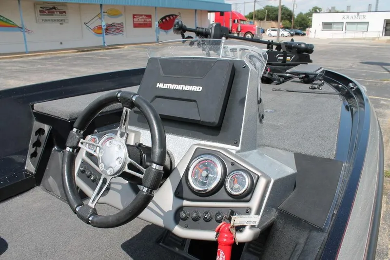 Slide: The Image of 2021 Ranger Z175 boat dashboard with Humminbird electronics and steering wheel. - 3