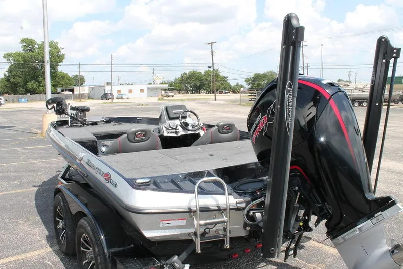 Slide: The Image of 2021 Ranger Z175 boat with Mercury Pro XS engine in a parking lot. - 5