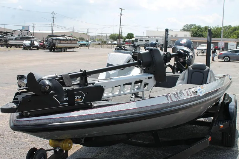 Slide: The Image of 2021 Ranger Z175 boat with Minn Kota Ultrex motor in a parking lot. - 7