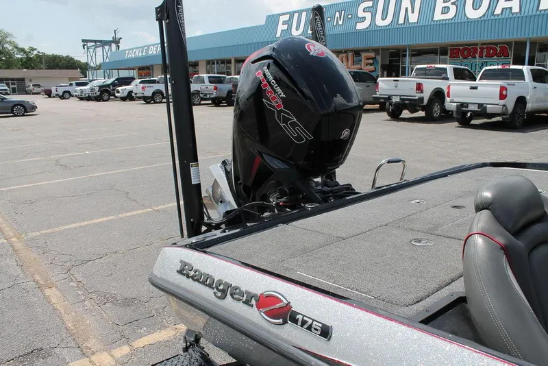 Slide: The Image of 2021 Ranger Z175 boat with motor in parking lot near dealership. - 8