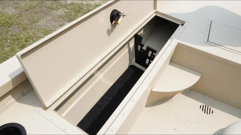 Slide: The Image of Open storage compartment on 2025 G3 Bay 19 GX boat, showcasing interior space. - 12