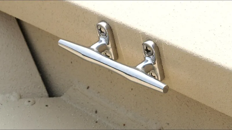 Slide: The Image of Chrome cleat on G3 Bay 19 GX boat, 2025 model, mounted on beige surface. - 23