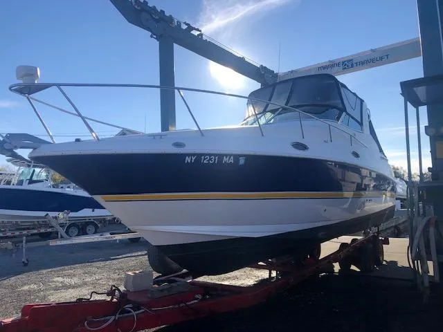 Slide: The Image of 2004 Cruisers Yachts 280 Express on trailer, ready for transport. - 25