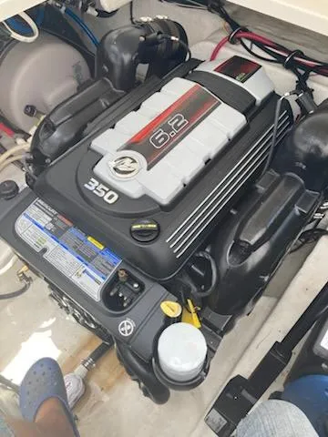 Slide: The Image of Engine of 2019 Monterey 295 Sport Yacht, featuring a 6.2L 350 horsepower motor. - 13