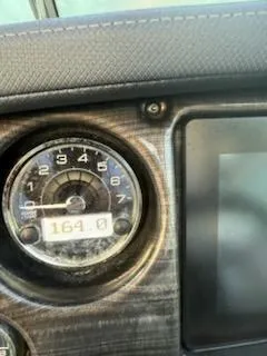 Slide: The Image of Dashboard of 2019 Monterey 295 Sport Yacht showing 164 hours on the gauge. - 8