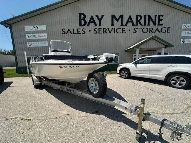Slide: The Image of 2007 Boston Whaler 200 Dauntless boat on trailer at Bay Marine dealership. - 3