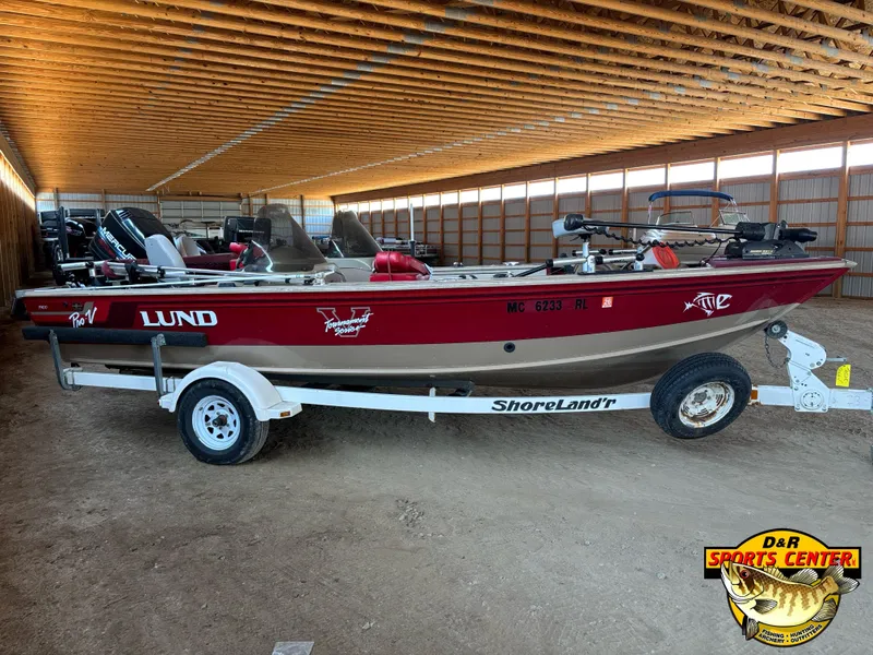 Slide: The Image of 1997 Lund 1900 Pro-V LE boat on ShoreLand'r trailer in storage facility. - 2