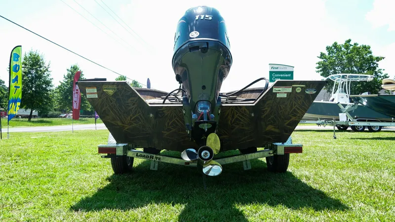 Slide: The Image of 2025 G3 Gator Tough 20 CC boat on trailer, displayed outdoors. - 22
