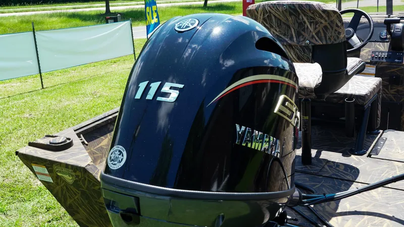 Slide: The Image of 2025 G3 Gator Tough 20 CC boat with Yamaha 115 outboard motor, camo seats. - 23