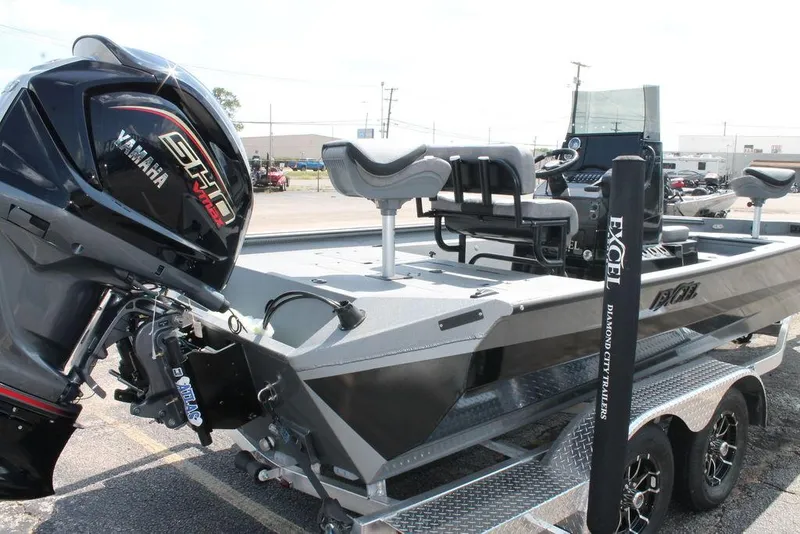 Slide: The Image of 2026 Excel Bay Pro Elite 220 boat with Yamaha engine on trailer. - 6