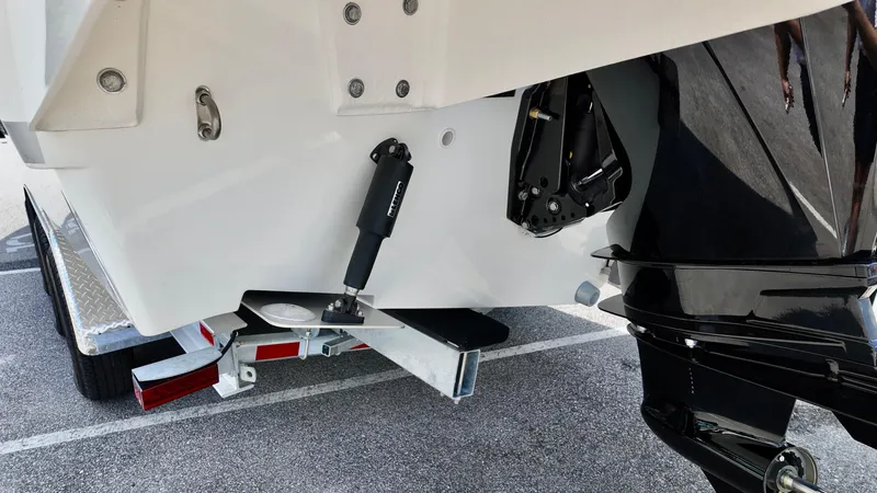 Slide: The Image of 2026 Bayliner Trophy 29 Explorer boat trailer and outboard motor detail. - 4