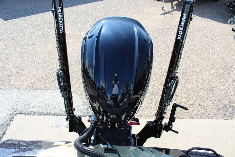 Slide: The Image of Top view of a 2026 Skeeter ZXE21 boat engine with Minn Kota accessories. - 11