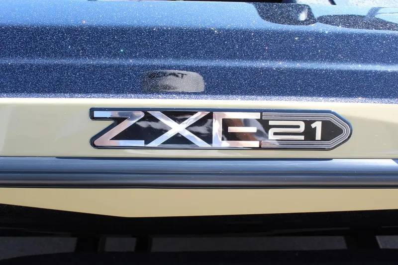 Slide: The Image of 2026 Skeeter ZXE21 logo on a metallic surface. - 17