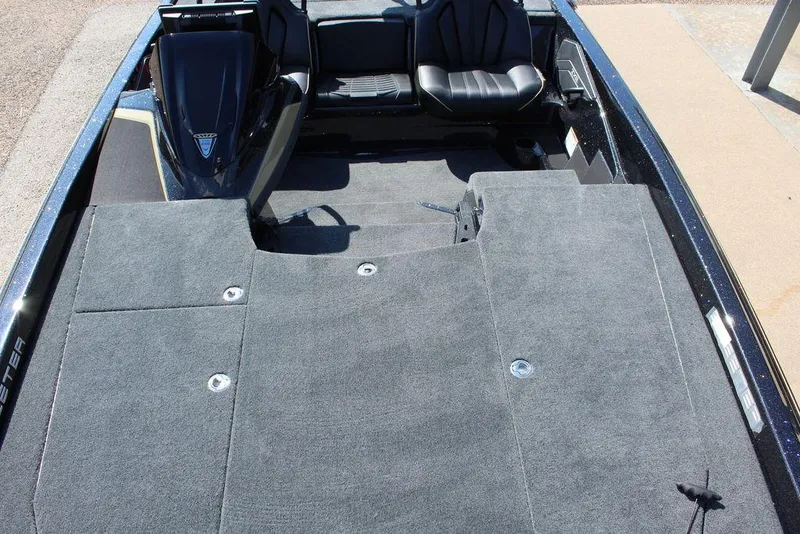 Slide: The Image of 2026 Skeeter ZXE21 boat interior with spacious seating and carpeted deck. - 19