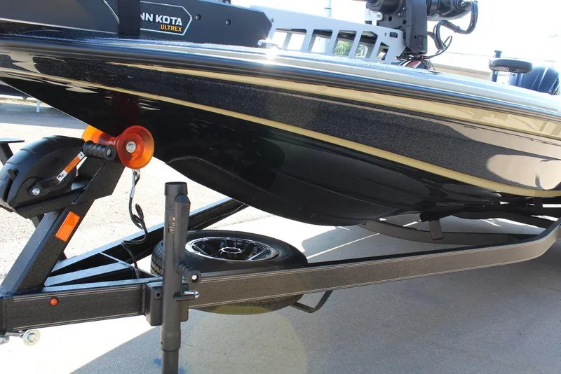 Slide: The Image of 2026 Skeeter ZXE21 boat on trailer with Minn Kota Ultrex motor. - 8