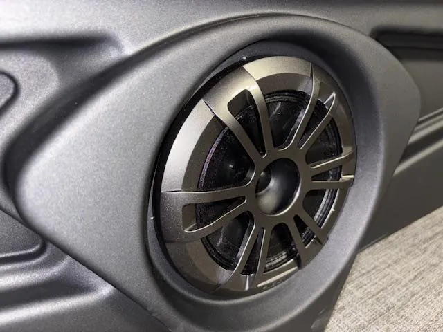 Slide: The Image of Close-up of a speaker on a 2025 Tahoe Pontoon SLT 2180 QL boat. - 19