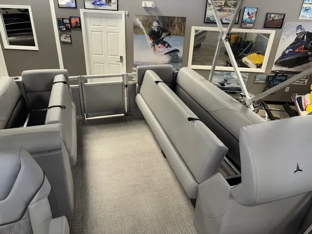 Slide: The Image of 2025 Tahoe Pontoon SLT 2180 QL interior with gray seating and modern design. - 21
