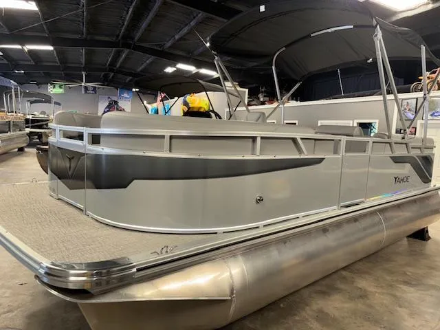 Slide: The Image of 2025 Tahoe Pontoon SLT 2180 QL in showroom, featuring sleek design and modern amenities. - 3