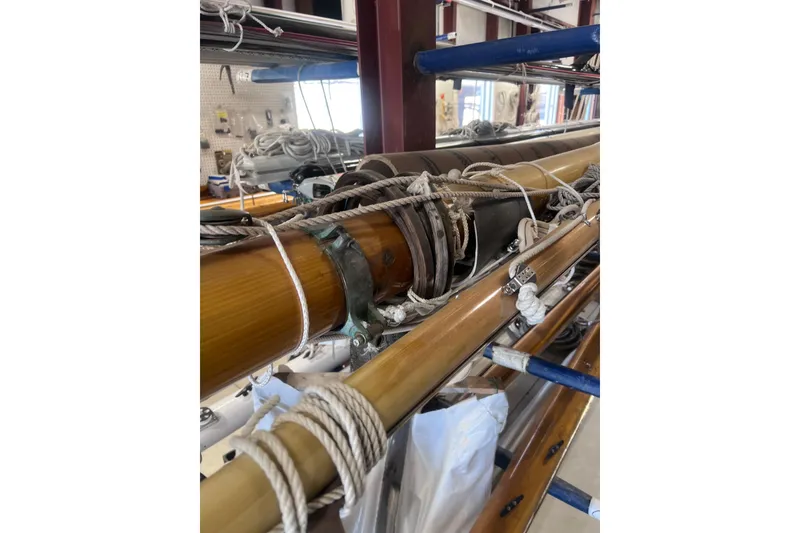 Slide: The Image of Stored wooden masts and rigging in a workshop, Arey's Pond 16, 2007 model. - 21