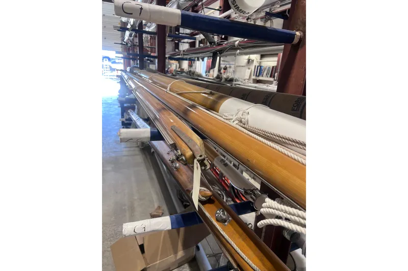 Slide: The Image of Stored wooden masts and rigging in a workshop, Arey's Pond 16, 2007 model. - 23
