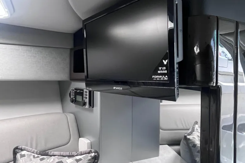Slide: The Image of Interior of 2016 Formula 310 SS with TV and seating area. - 21