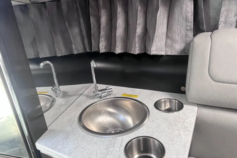 Slide: The Image of 2016 Formula 310 SS interior with modern sink and countertop design. - 22