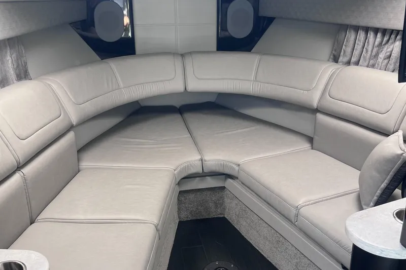 Slide: The Image of Luxurious interior of a 2016 Formula 310 SS boat with plush seating. - 23