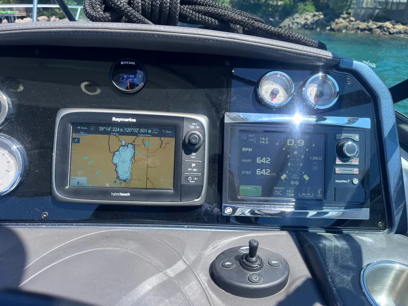 Slide: The Image of Dashboard of a 2016 Formula 310 SS boat with navigation and engine displays. - 7