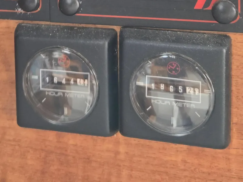 Slide: The Image of Hour meters on 1991 Bayliner 3288 Motoryacht dashboard, displaying engine hours. - 41