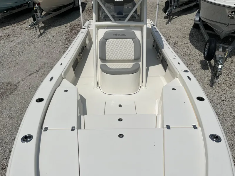Slide: The Image of 2026 Avenger AV26 boat interior with seating and storage compartments. - 12