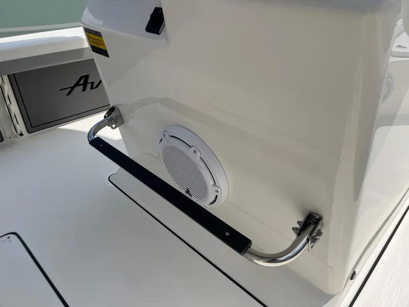 Slide: The Image of 2026 Avenger AV26 boat interior with speaker and handrail detail. - 18