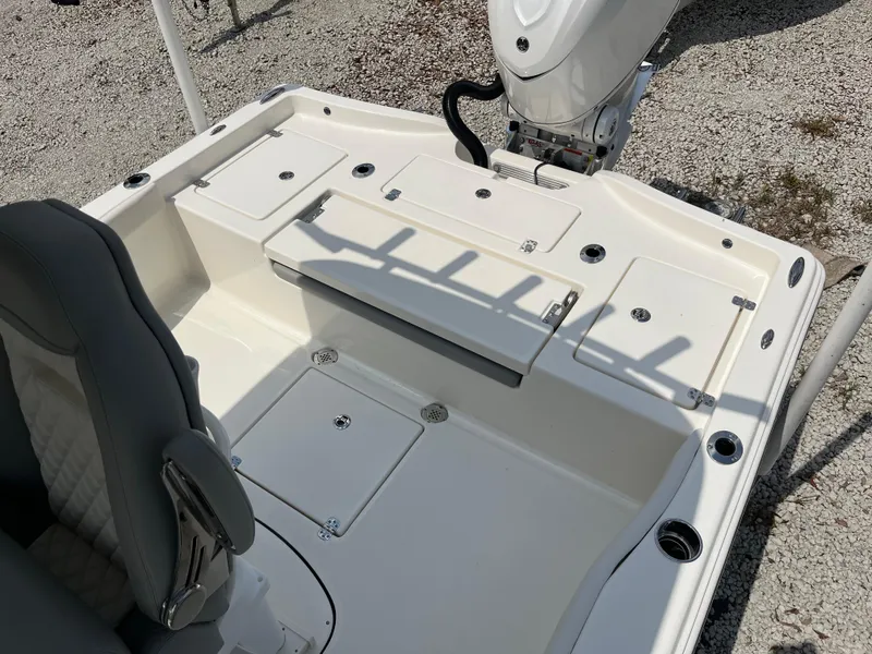 Slide: The Image of Avenger AV26 2026 boat interior with storage compartments and seating. - 22