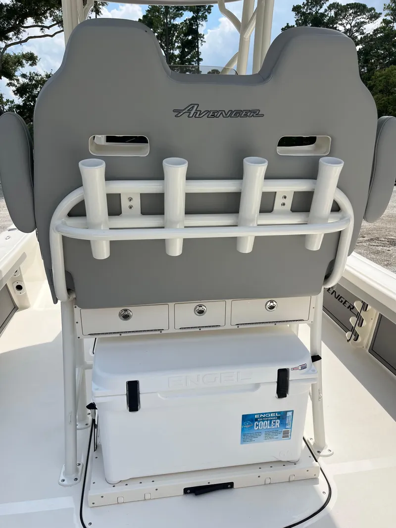 Slide: The Image of 2026 Avenger AV26 boat seat with rod holders and Engel cooler. - 25