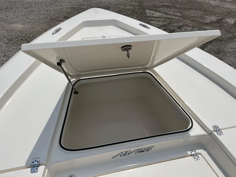 Slide: The Image of Open storage compartment on 2026 Avenger AV26 boat, showcasing spacious interior. - 7