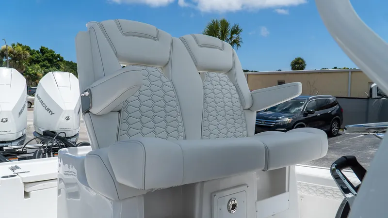 Slide: The Image of Luxury seating on 2026 Tidewater 2700 Carolina Bay boat, featuring stylish design and comfort. - 21