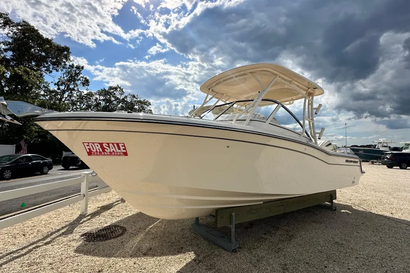 The Image of 2026 Grady-White Freedom 235 boat for sale under cloudy sky. - 0