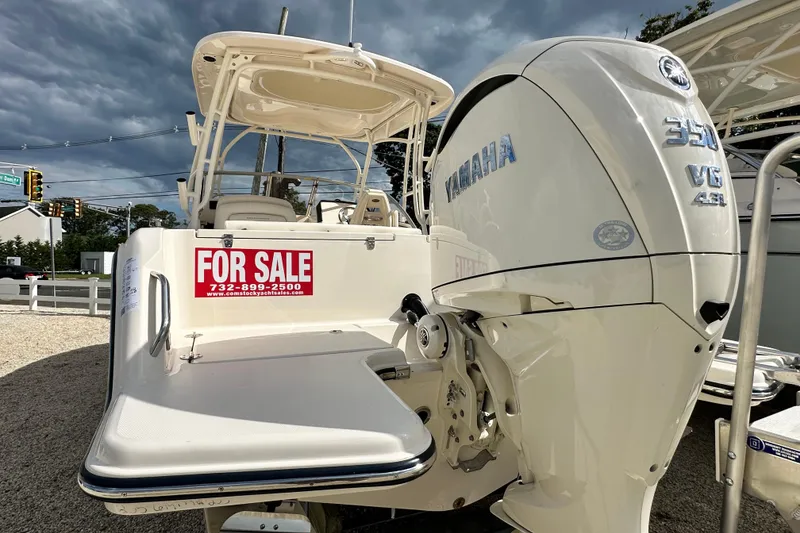 Slide: The Image of 2026 Grady-White Freedom 235 boat for sale with Yamaha engine, outdoor display. - 3